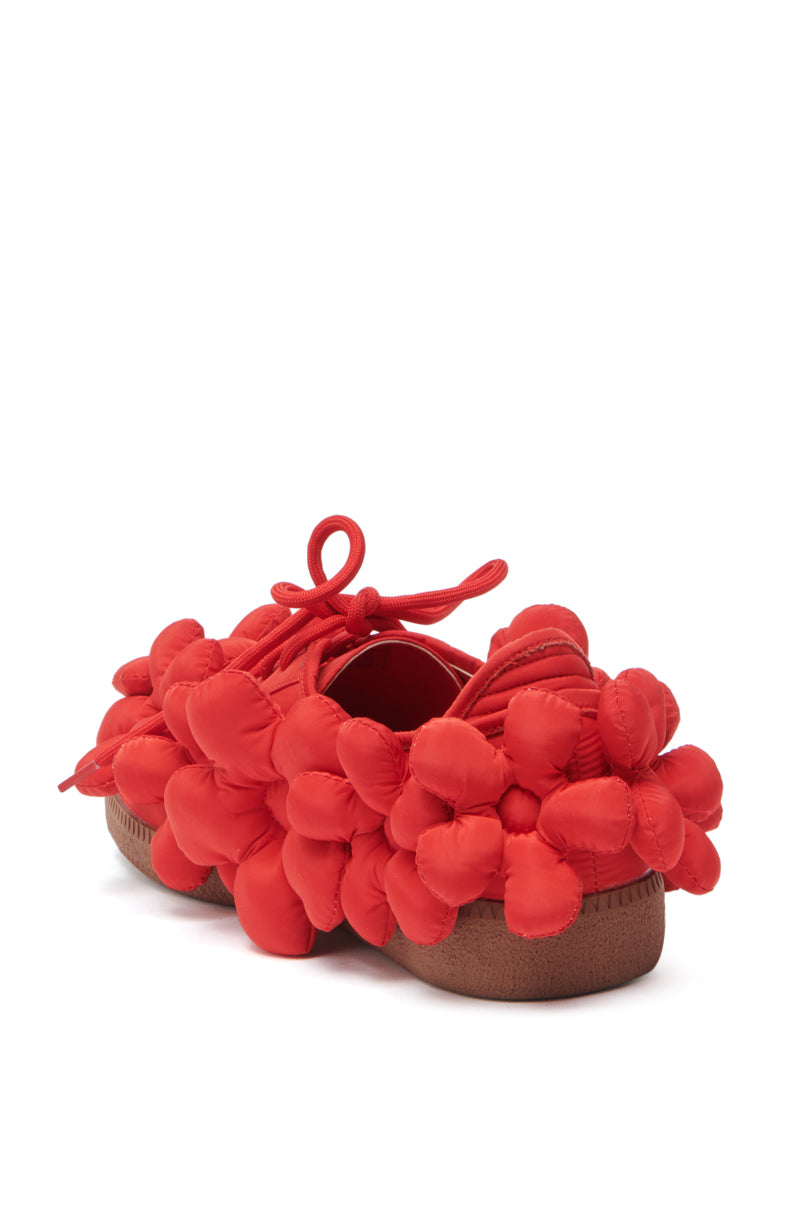 The AZALEA WANG GREYI RED PUFF FLORAL FLAT SNEAKER features a red upper with brown sole, adorned with puffy balloon-like floral appliques on the upper and sides for a playful flair, shown from the back.