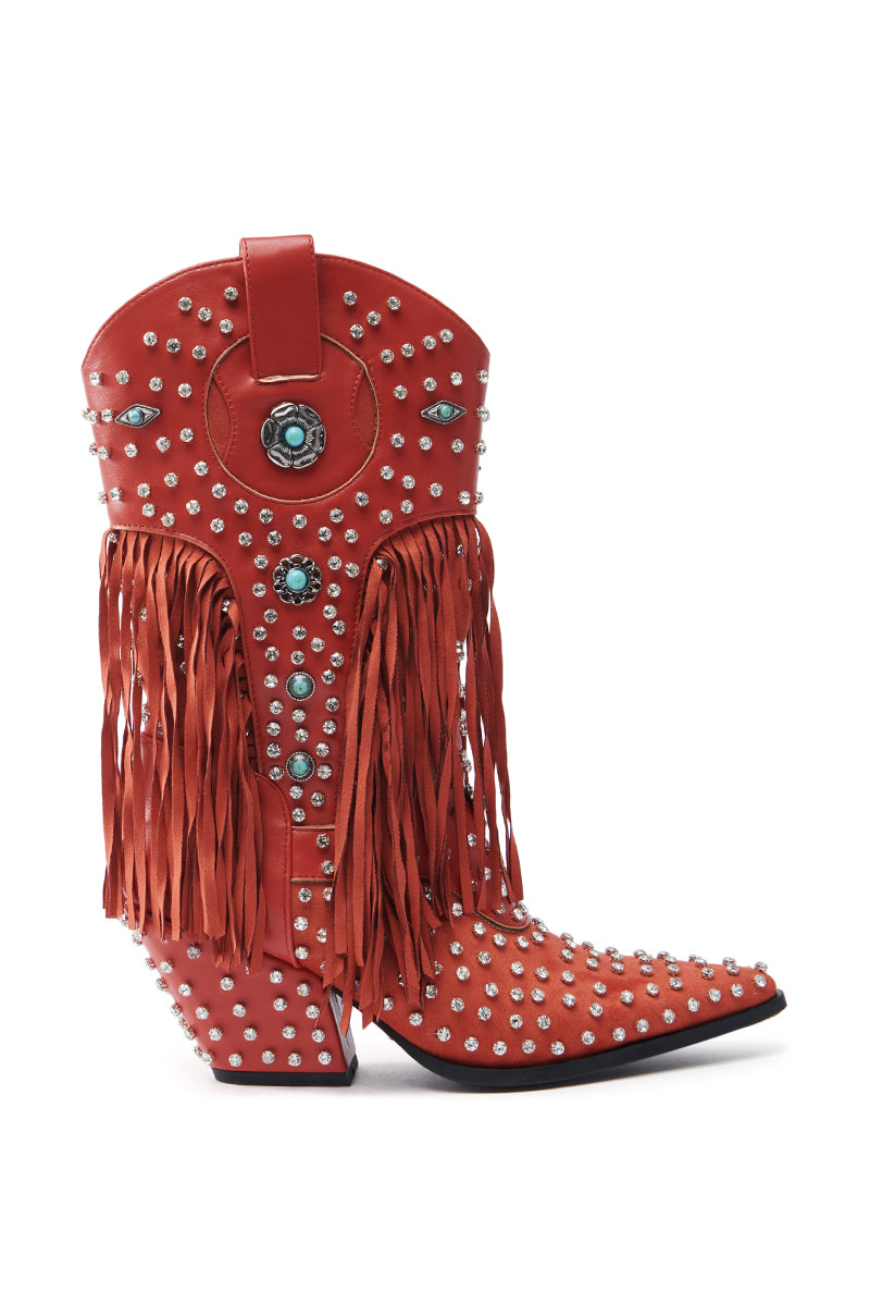 The AZALEA WANG GREYSON RED BOOT is a Western-inspired masterpiece with rhinestone studs, turquoise accents, and fringe for texture. Featuring a high heel and pointed toe, it's perfect for making a bold statement.
