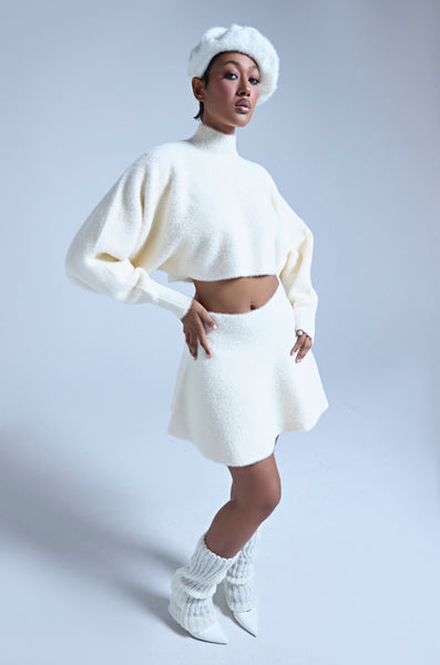 CUDDLE UP FUZZY MINI SKIRT IN IVORY – AKIRA