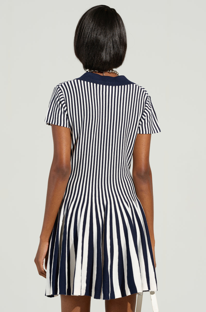 ALINA PLEATED KNIT FIT AND FLARE MINI DRESS IN NAVY AKIRA ALINA PLEATED KNIT FIT AND FLARE MINI DRESS IN NAVY AKIRA