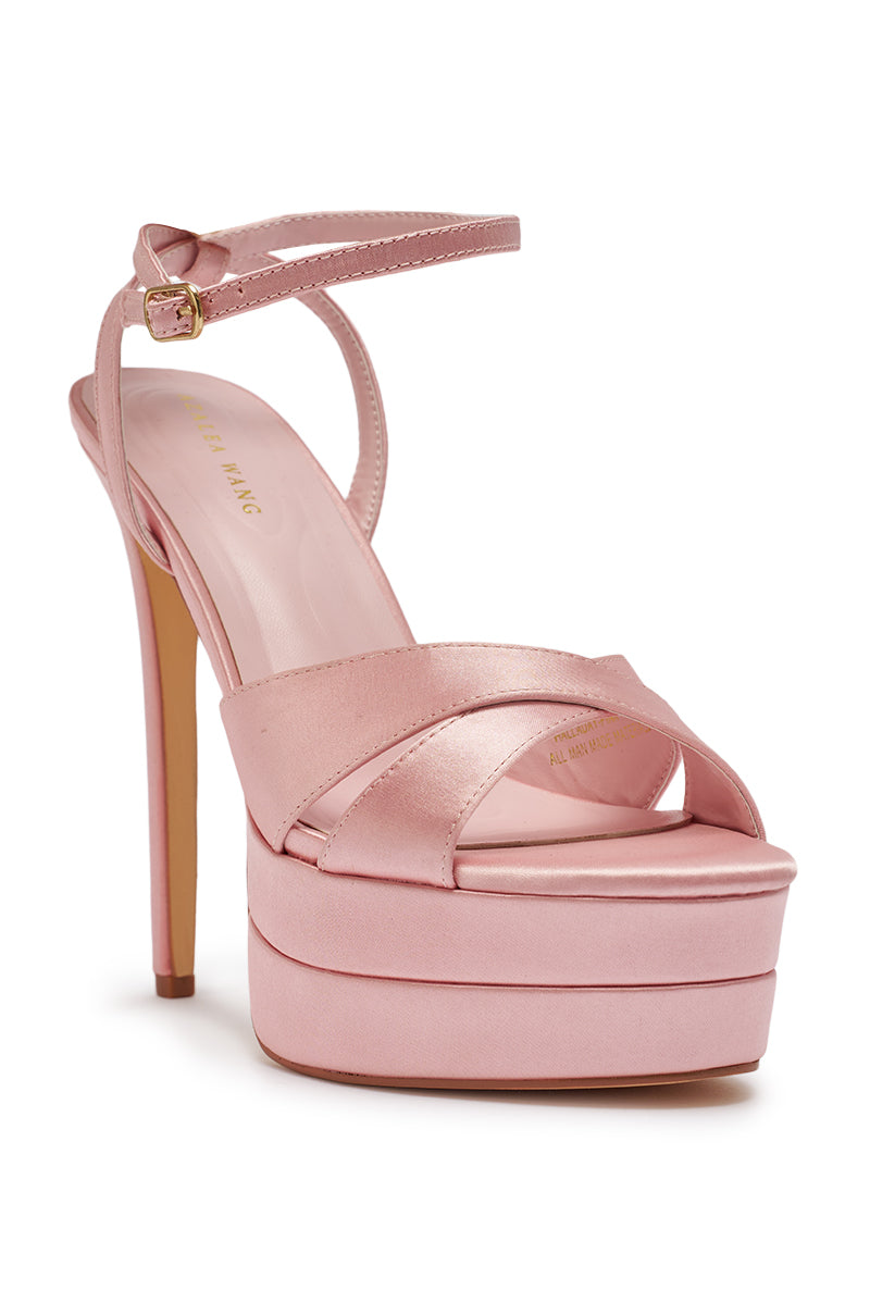 The AZALEA WANG HALLADAY Pink Satin Platform Stiletto Sandal features shiny pink crisscross straps, an ankle strap with a gold buckle, and a tall stiletto heel for a bold statement. 8
