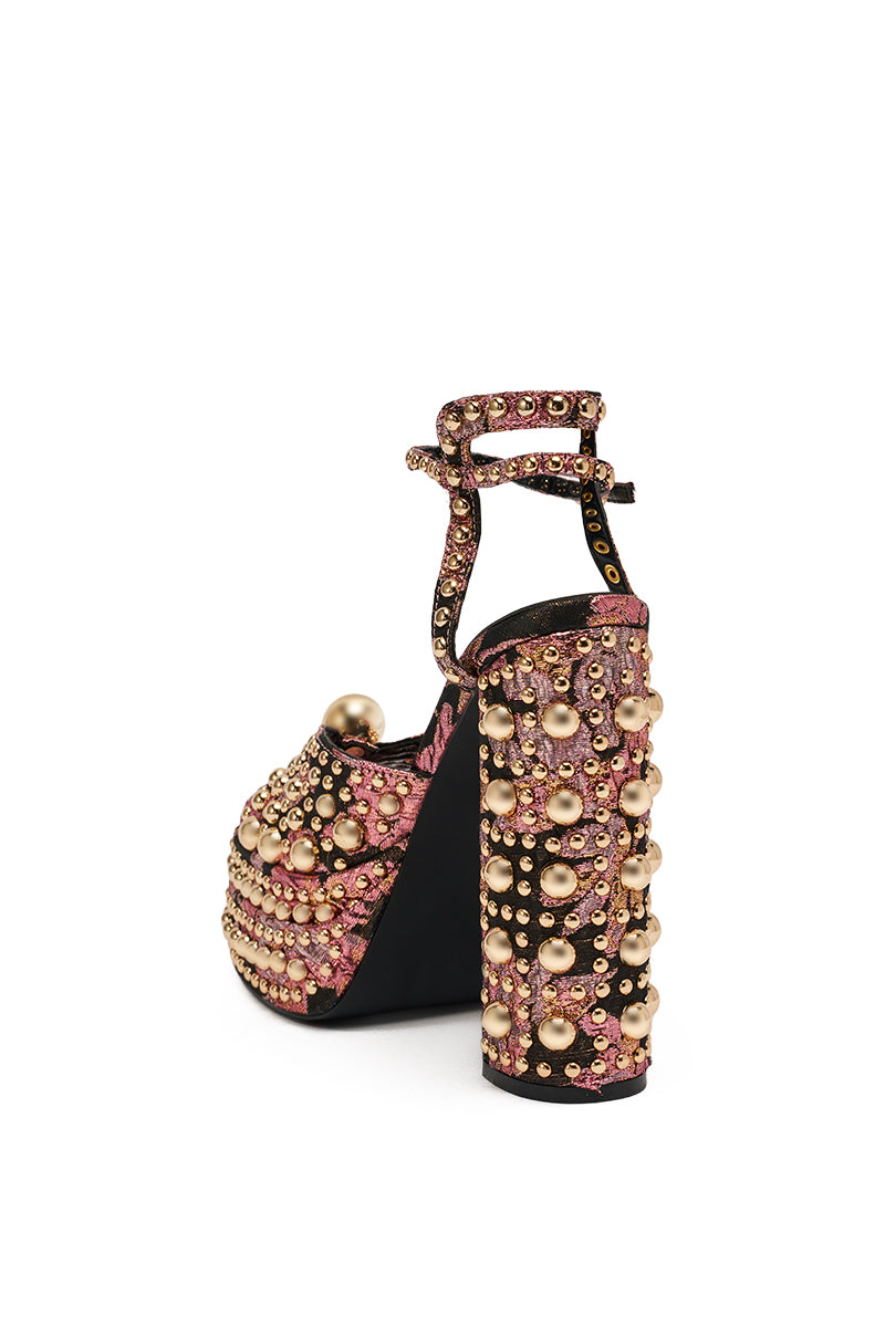 The AKIRA HANNESS BLACK MULTI BROCADE EMBELLISHED CHUNKY SANDAL features a platform heel and ornate brocade details.
