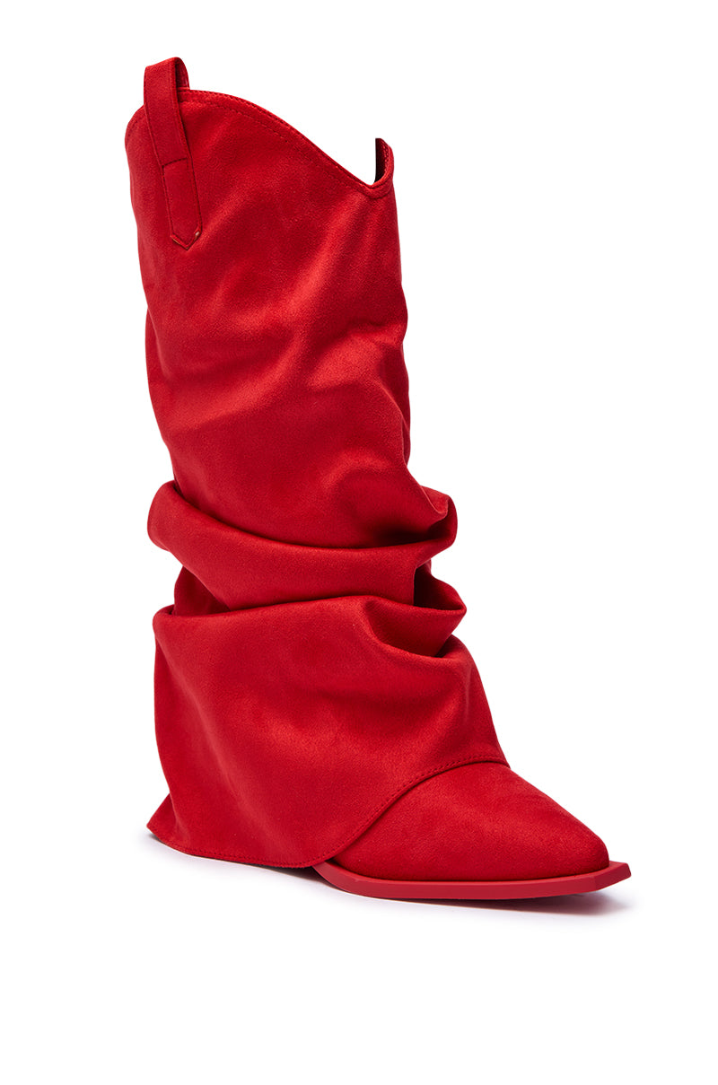 The AZALEA WANG HAWKSTON RED RUCHED WESTERN BOOTIE is a single, knee-high bright red bootie with a slouchy fit, pointed toe, flat sole, and crafted from soft satin-like material.