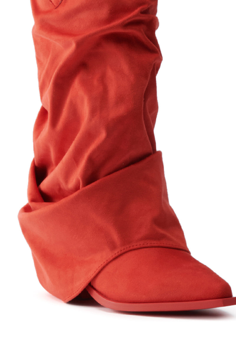 The AZALEA WANG HAWKSTON RED RUCHED WESTERN BOOTIE features a slouchy, pointed-toe design in red faux suede with a folded-over cuff and chunky heel.