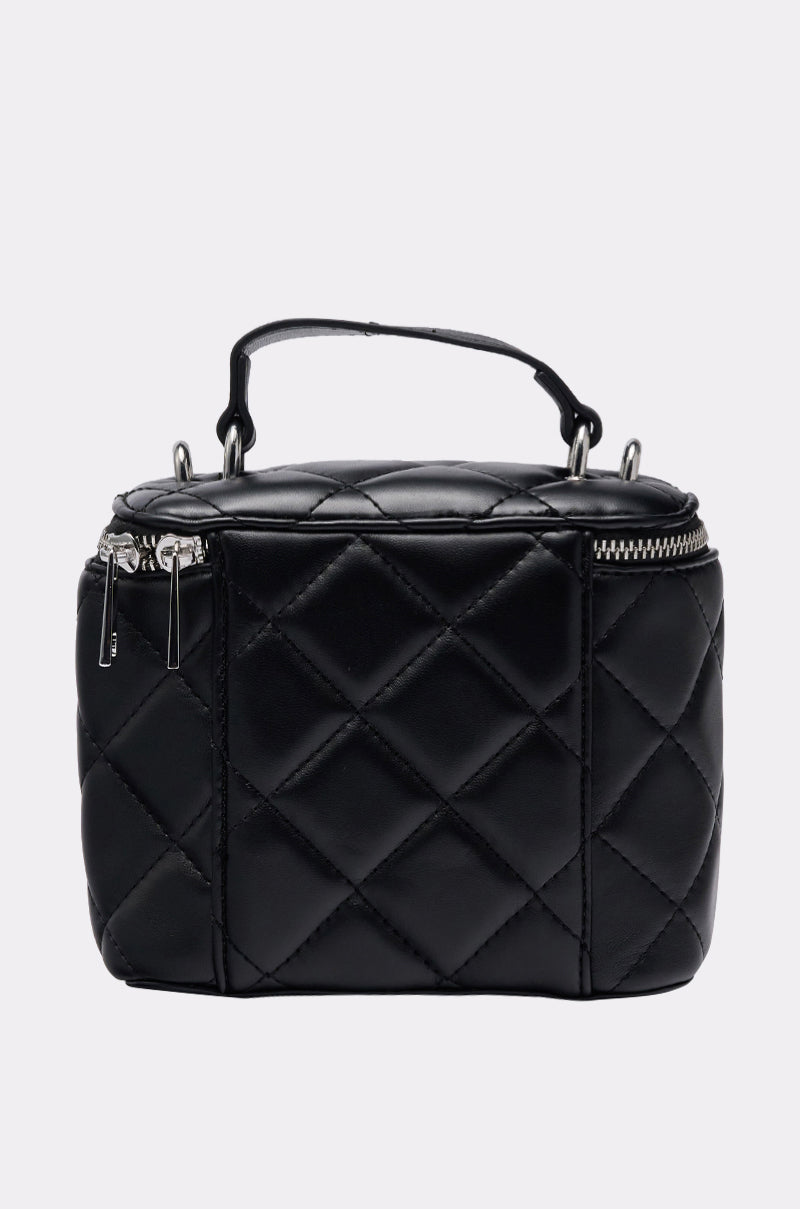 The IN PARIS QUILTED PURSE is a small black faux leather bag with a top handle and silver zipper accents, shown against a plain light background. 3