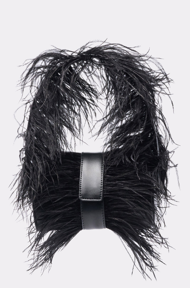 The FEATHER CRAZE PURSE is a black evening bag featuring a feathery textured design and smooth leather front strap, set against a light background—ideal as a statement accessory for special occasions. 0