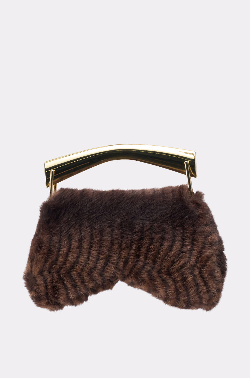 The COCO FAUX FUR BAG is a small, rectangular handbag with brown striped faux fur and a metallic gold handle, displayed against a plain light background. 0