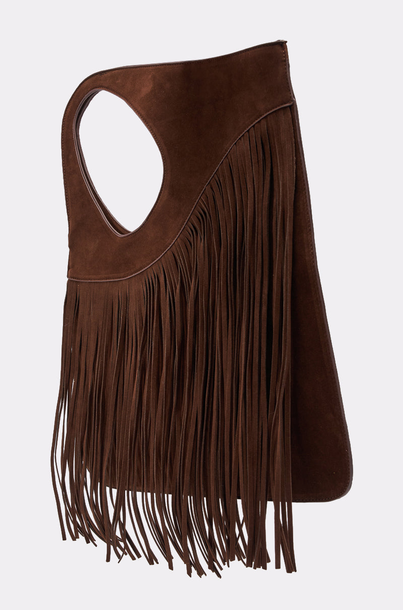 The FRINGED OUT SHOULDER PURSE is a brown faux suede handbag with a large handle cutout, long western-style fringe, and a soft, slouchy silhouette for an effortlessly modern look. 3