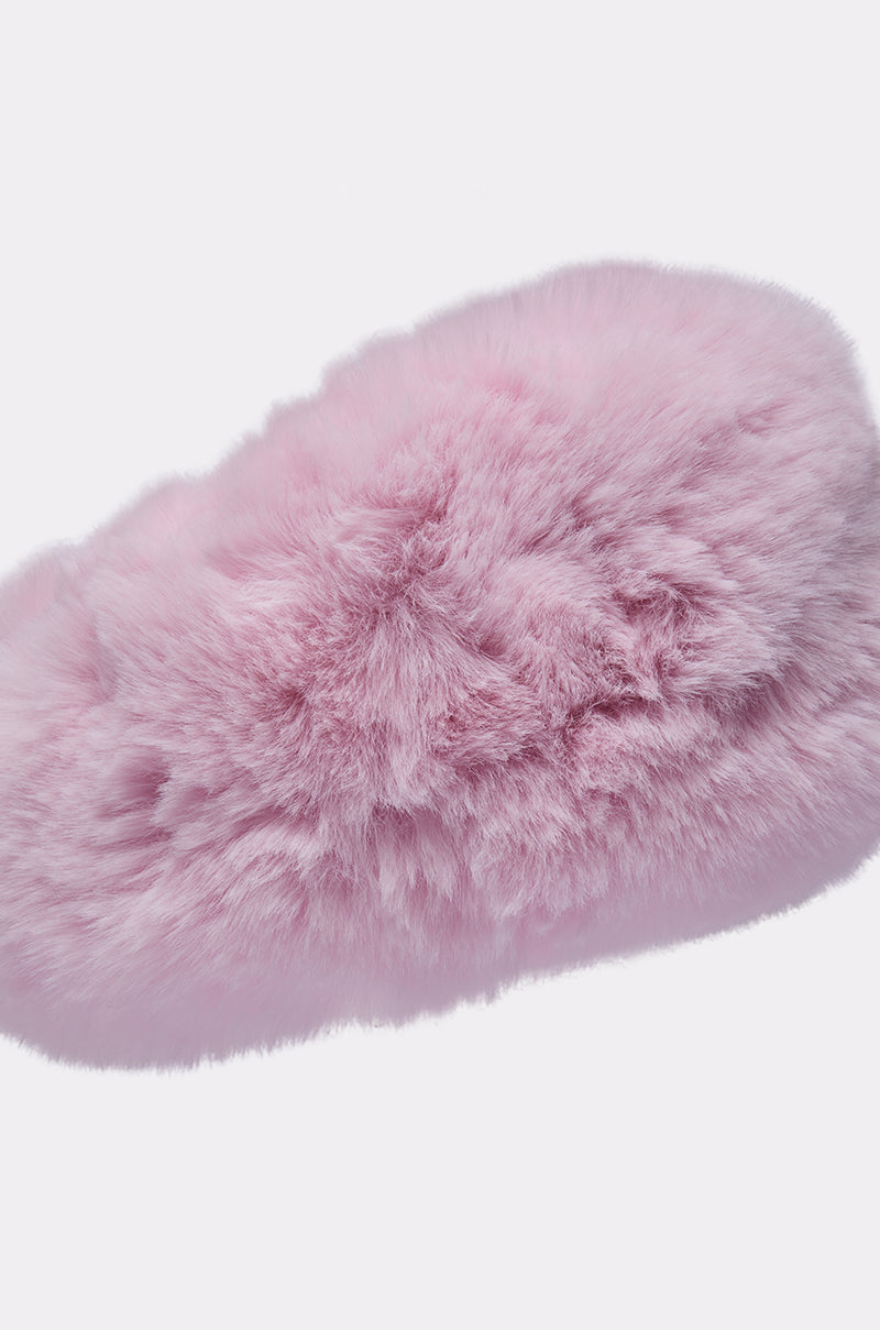 The BB GURLLL FAUX FUR HEADBAND, shown in fluffy pink faux fur against a white background, is a cozy cold weather accessory that adds warmth and stylish flair. 3