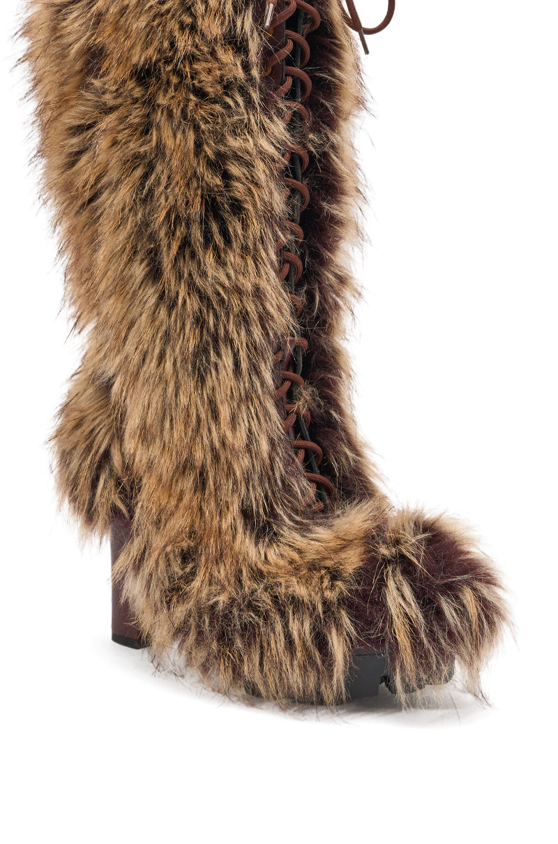 The AZALEA WANG HEARTBEAT BROWN MULTI BLOCK FUR BOOT features thick brown faux fur, a front lace-up design, and a chunky block heel—perfect for bold winter style and warmth. 5