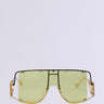The BOUJEE BISH SUNGLASSES feature yellow-tinted lenses and an oversized rectangular frame with black accents. The bold design is complemented by unique transparent temples, making them ideal for a contemporary statement.