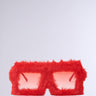 These I'M PAST THIS FUZZY SUNGLASSES feature a quirky oversized monobrow silhouette with red, fur-covered square frames and playful pink-tinted lenses.