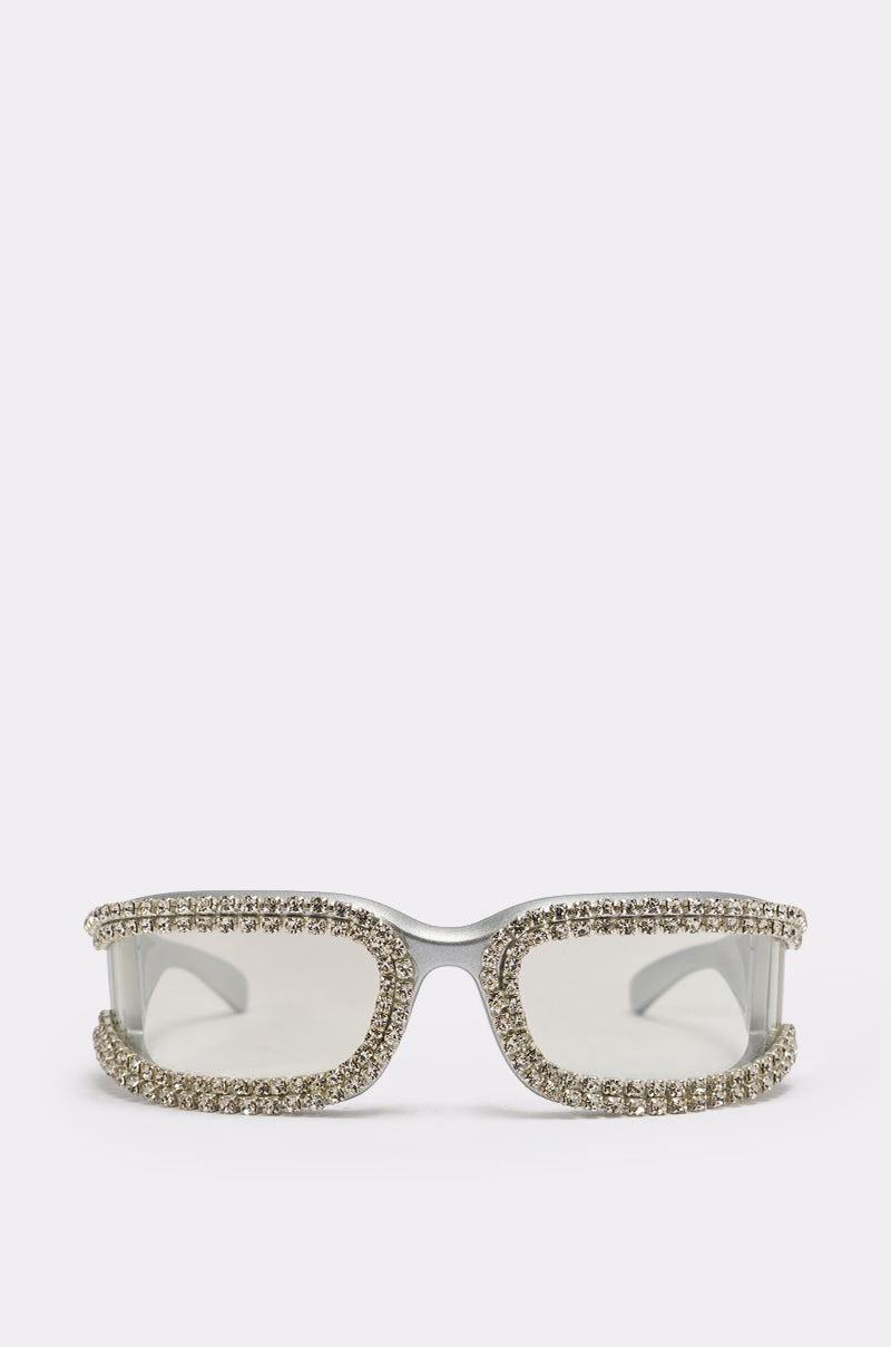 NIKKI SUNGLASSES with rectangular lenses, a thick border, and sparkling rhinestone trim are displayed against a plain white background. 0