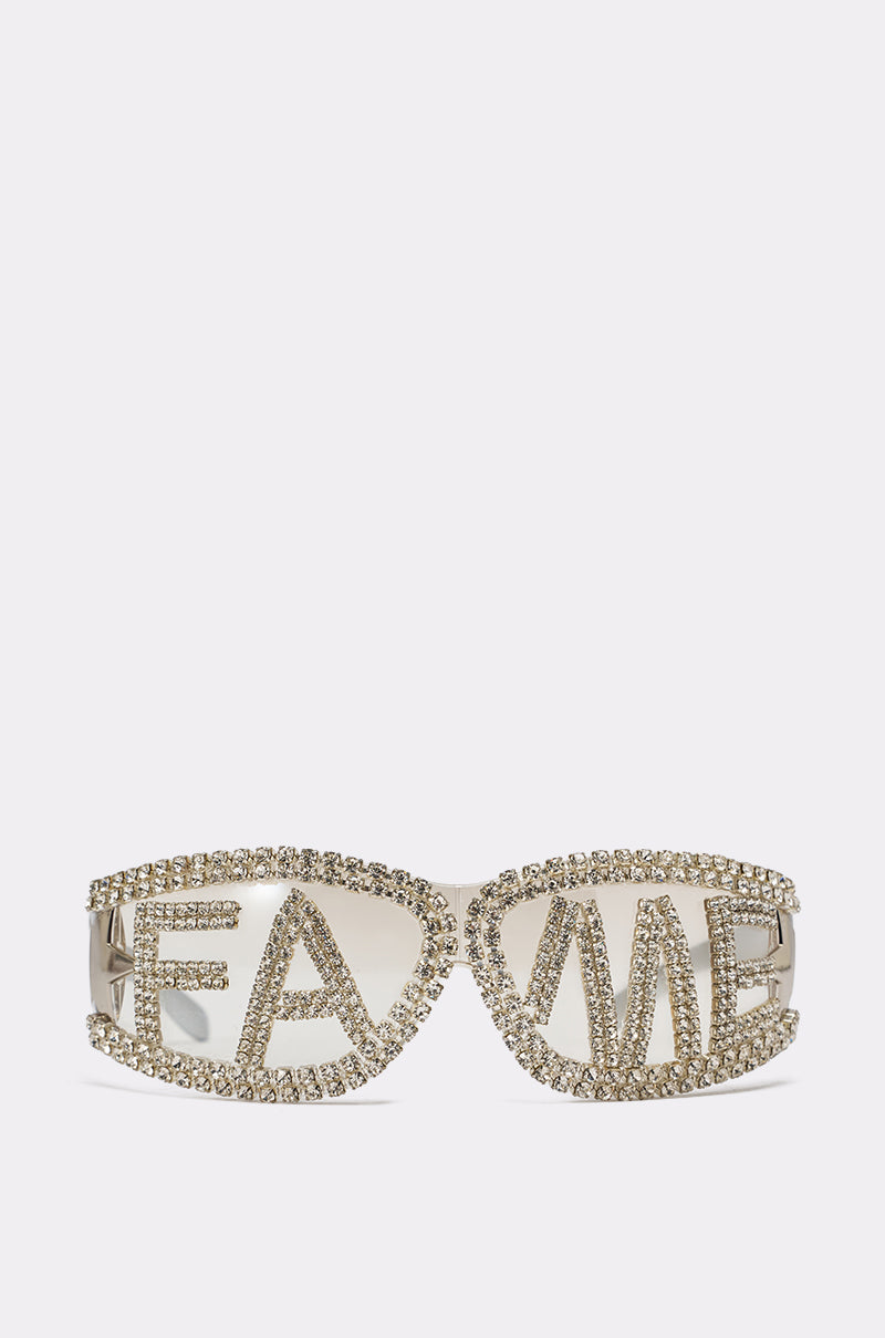 FAME SUNGLASSES: Crystal-lettered sunglasses with rhinestones, boldly spelling "FAME" across the lenses. 2