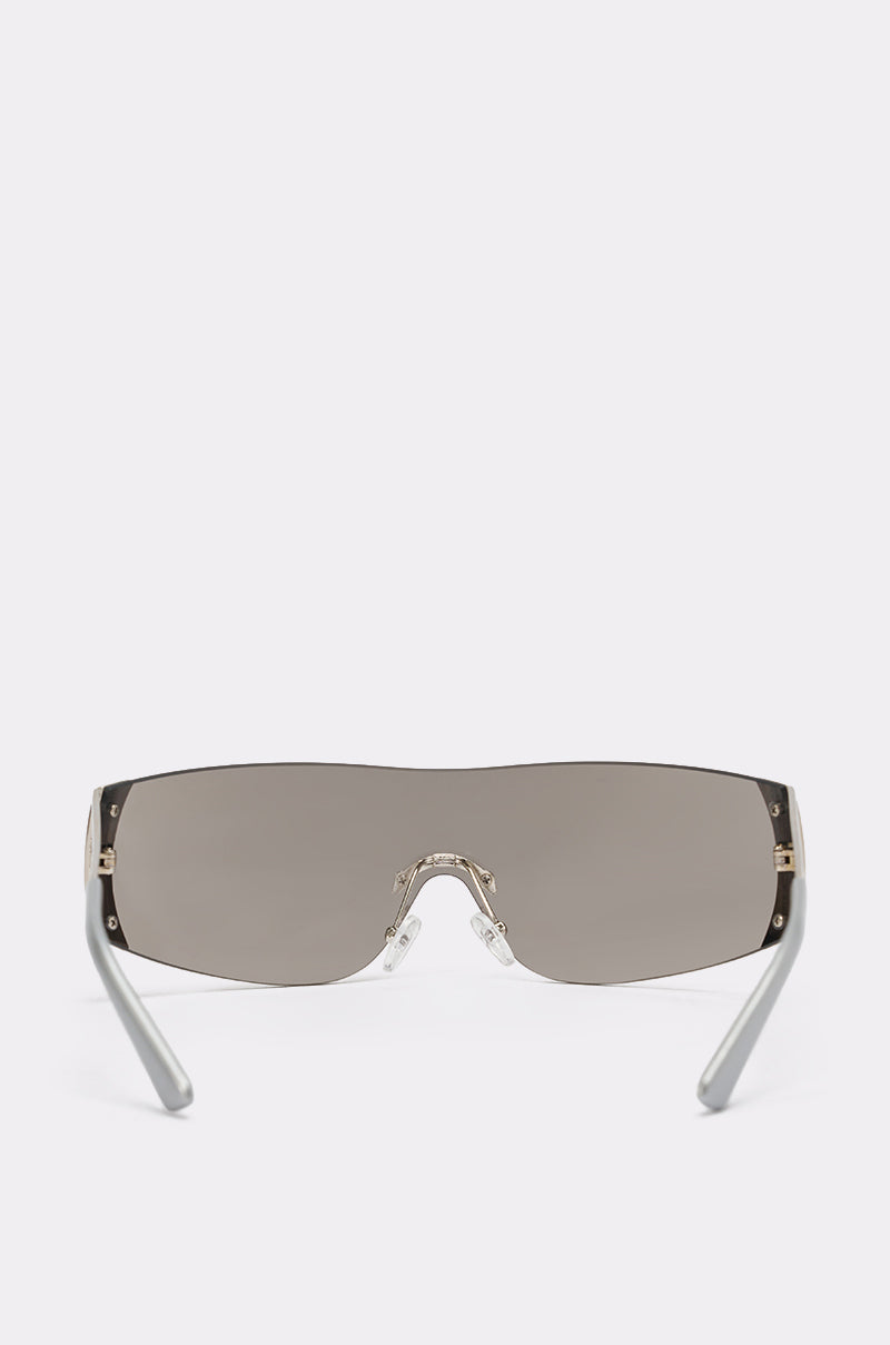 The EVERY DAY SUNGLASSES feature sleek, rectangular wraparound gray-tinted lenses and silver frames, shown facing forward with the arms slightly angled outward against a plain white background. 6