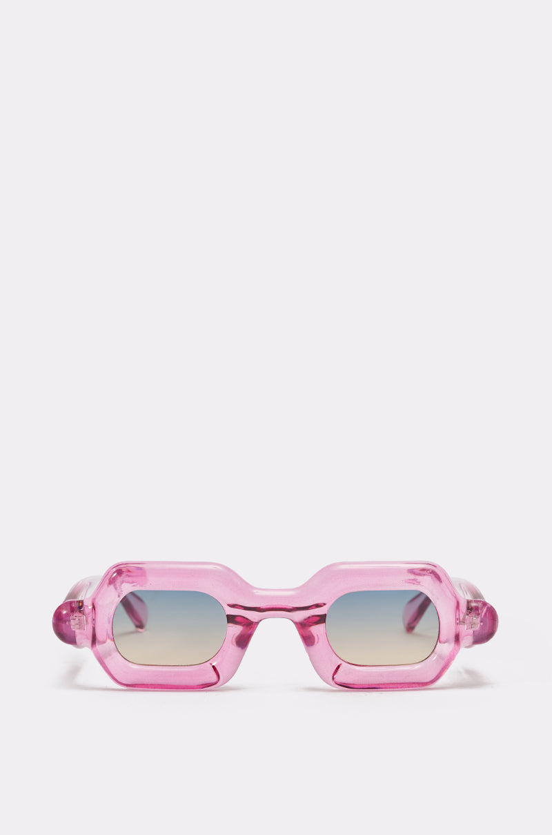 JELLY SUNGLASSES feature chunky rectangular frames in translucent pink and gradient blue-to-beige lenses, shown against a plain white background. 0
