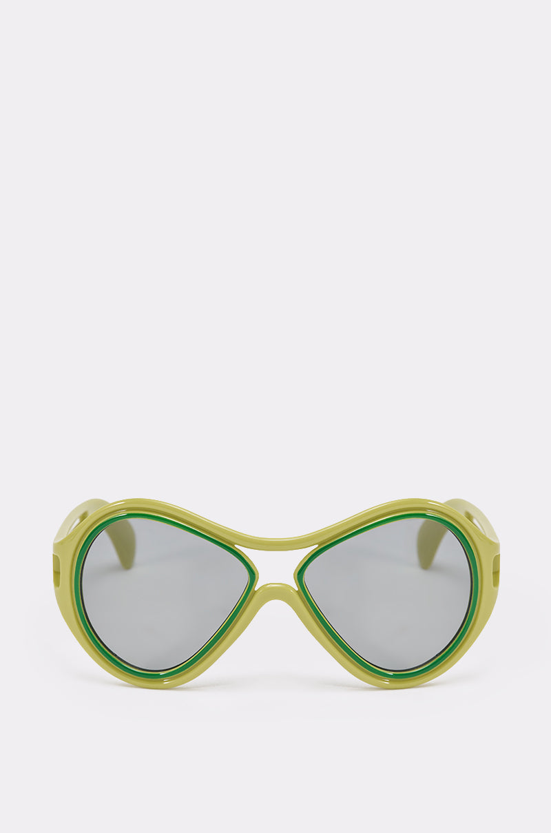 IN MY WORLD SUNGLASSES: Lime-green retro sunglasses with thick, rounded frames and dark tinted lenses, shown against a plain white background. 0