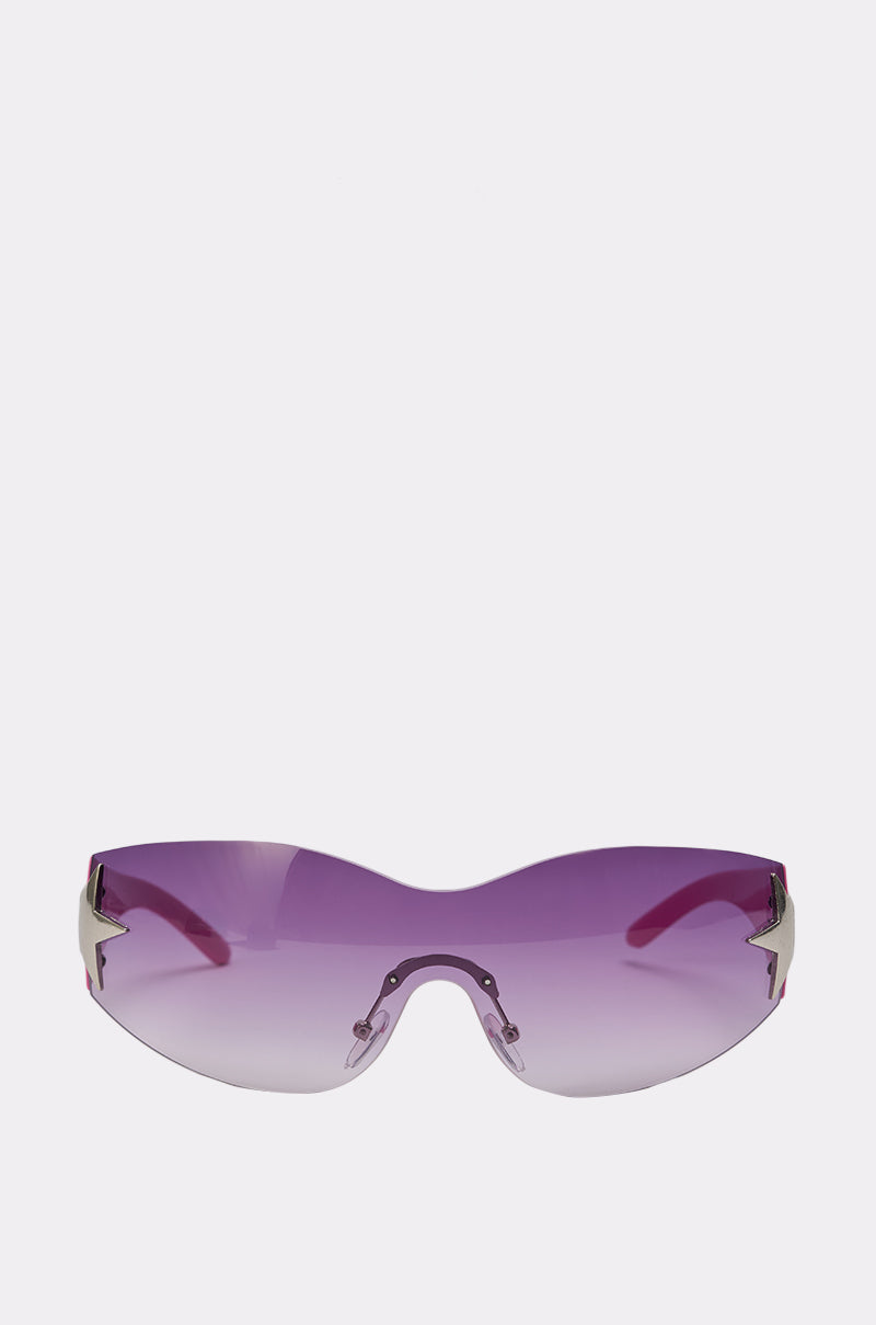 MIMI SUNGLASSES feature a futuristic design with oversized, purple-tinted frameless lenses and silver side accents, shown against a plain light background. 3