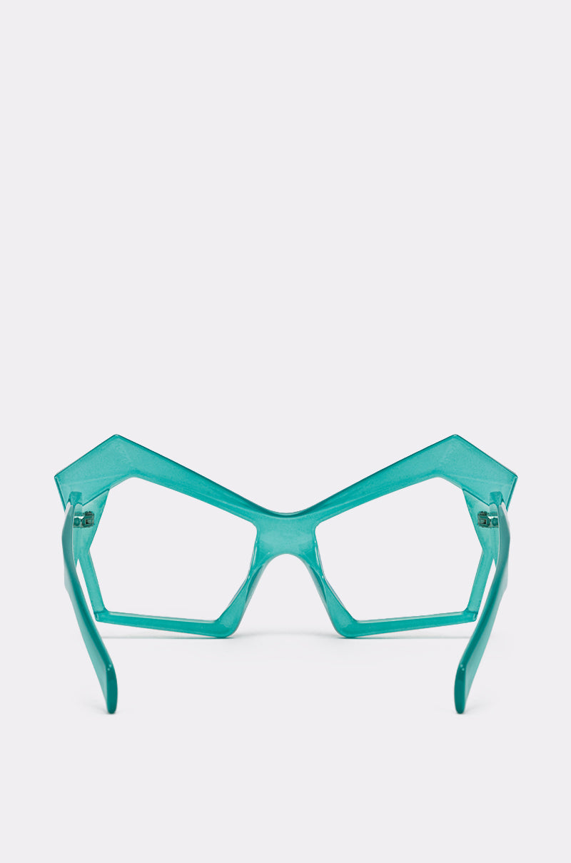KYLEIGH GLASSES: Turquoise sunglasses with geometric, angular frames and thick arms, displayed front-facing on a plain white background. 4