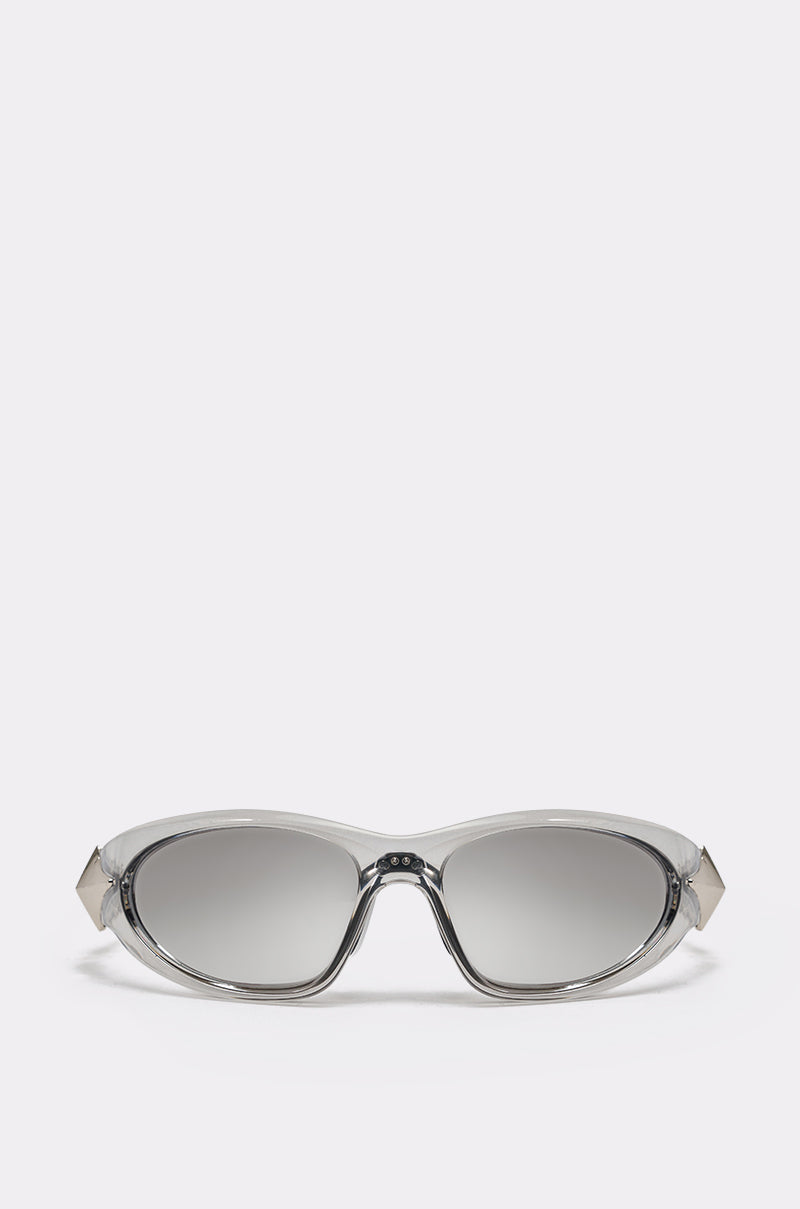 STARSTRUCK SUNGLASSES feature a sleek oval shape with futuristic wrap design, lightweight translucent gray plastic frames, and dark gradient lenses, shown against a plain white background. 0