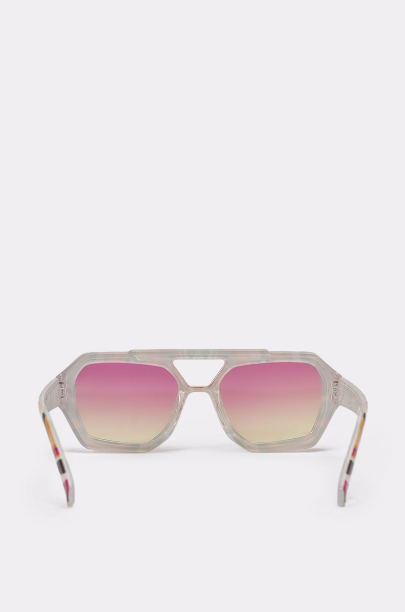 The FEEL THE BEAT SUNGLASSES feature oversized translucent geometric frames and pink-to-yellow gradient lenses, shown facing forward on a plain white background. 4