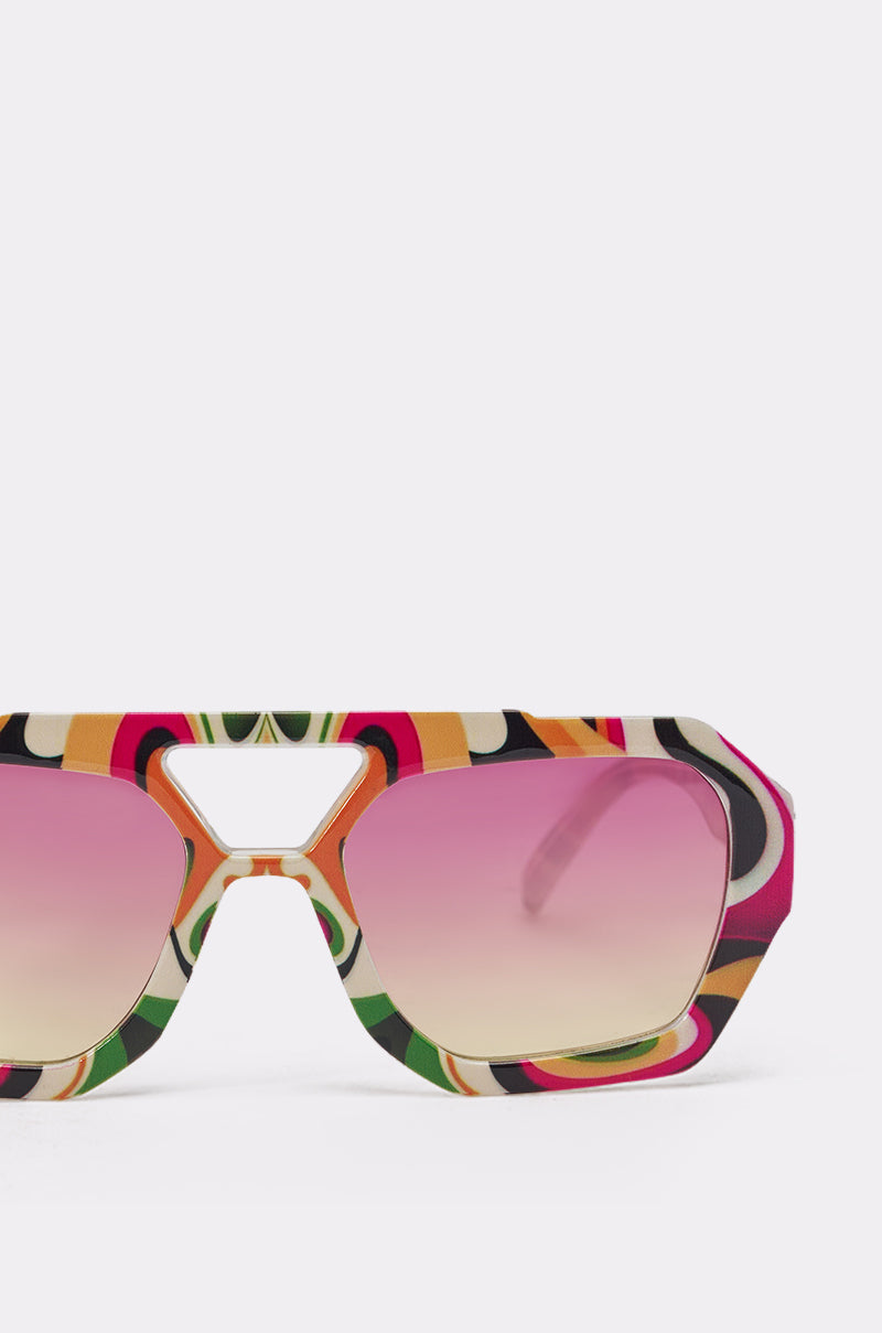 Close-up of FEEL THE BEAT SUNGLASSES: multicolor square frames with a pink gradient lens, featuring bold patterns—perfect oversized shades to make a statement against a plain white background. 5