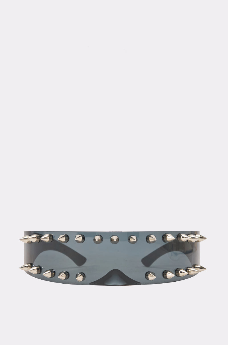 SPIKED OUT SUNGLASSES featuring dark tinted black shields and striking silver spike accents along the top and bottom edges, ideal for festivals, showcased on a plain white background.