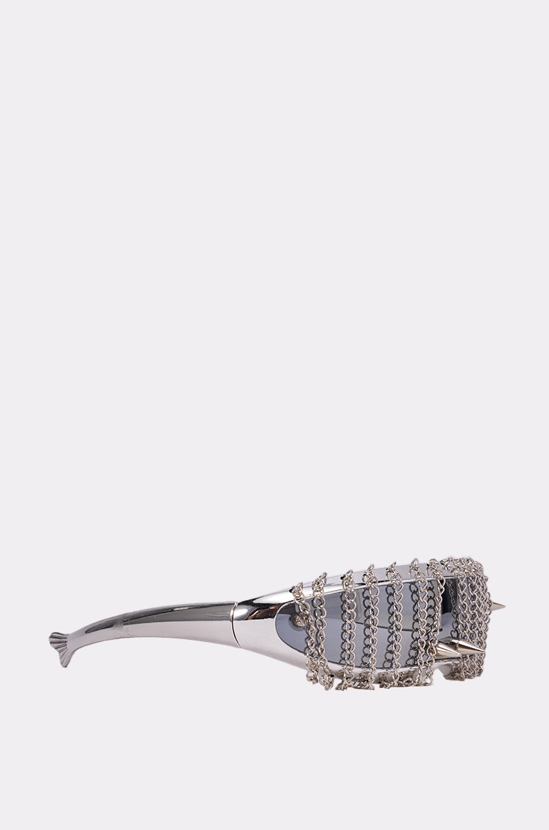CHAINED DOWN SUNGLASSES feature silver shield-style rectangular lenses with rows of sparkling rhinestones across the front, plus sleek metallic arms with a fin-like detail. Ideal for making a statement at festivals. Shown on a plain white background. 2