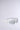 The ICED OUT SUNGLASSES feature white, sculptural frames with icicle-inspired shapes, wavy textures, and mirrored lenses. Bold and artistic, these eyewear pieces stand out against a light gray background with hand-crafted detailing.