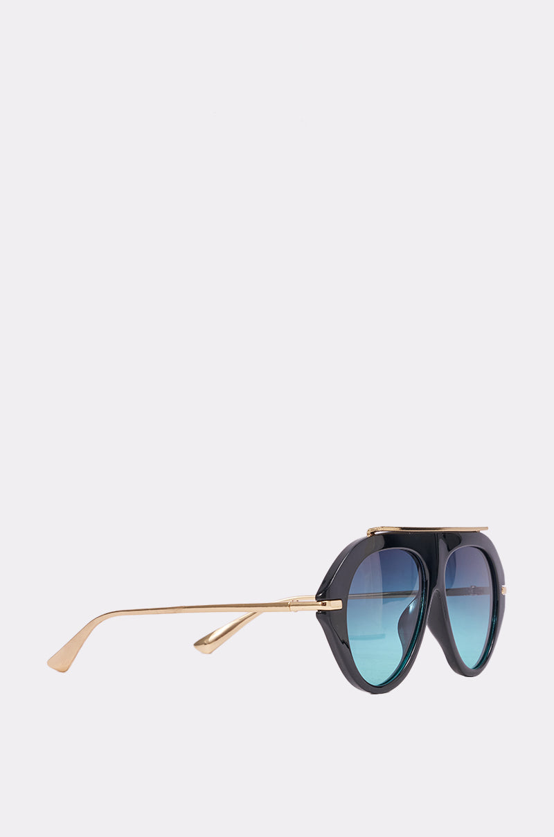Side view of LUXE AIR SUNGLASSES IN BLACK BLUE, featuring fashionable oversized aviator style with black rounded frames, blue-tinted lenses, and slim gold metal arms on a plain light background. 3