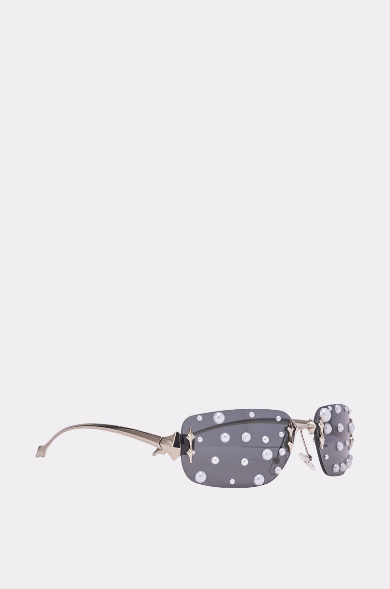MIDNIGHT DRIP SUNGLASSES: Grey rectangular frames with gold arms, white pearl and gold star accents on the frames and temples—perfect for festivals. Shown against a plain white background. 2