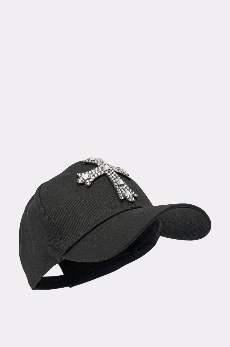 The EMBELLISH ME BASEBALL HAT showcases a bold rhinestone cross on the front panel, set against a plain light gray background. 3