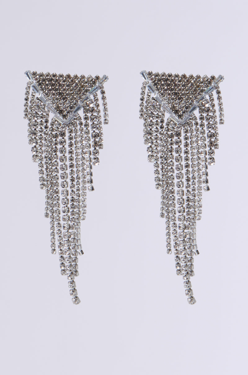 Explore the KNOW YA WORTH EARRING, a stunning piece that boasts a sparkling chandelier style with rhinestone accents. The triangular tops lead to cascading layers in a dangle fringe link design, crafting an elegant and symmetrical creation that beautifully reflects light against any plain backdrop.