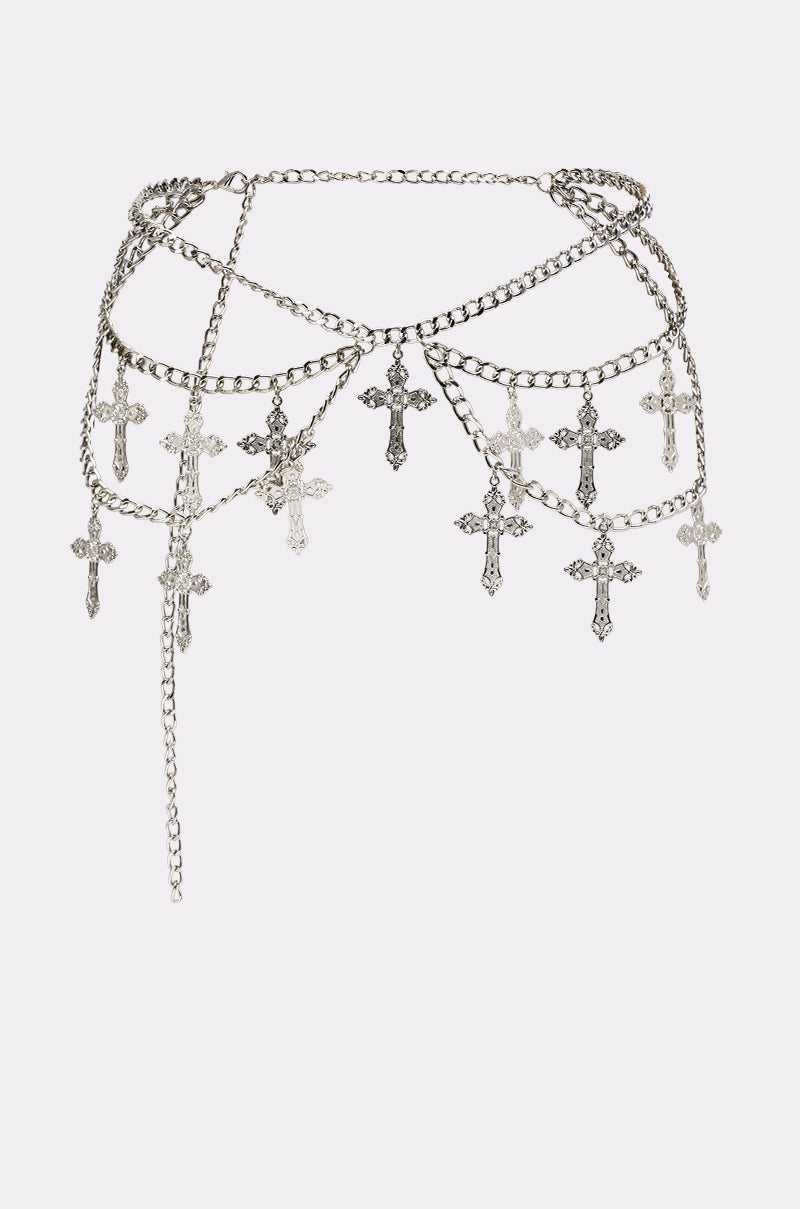 The CROSS MY HEART CHAIN BELT features three draped silver chains with ornate cross charms and an adjustable clasp, adding a bold, gothic-inspired accent to any outfit. 1