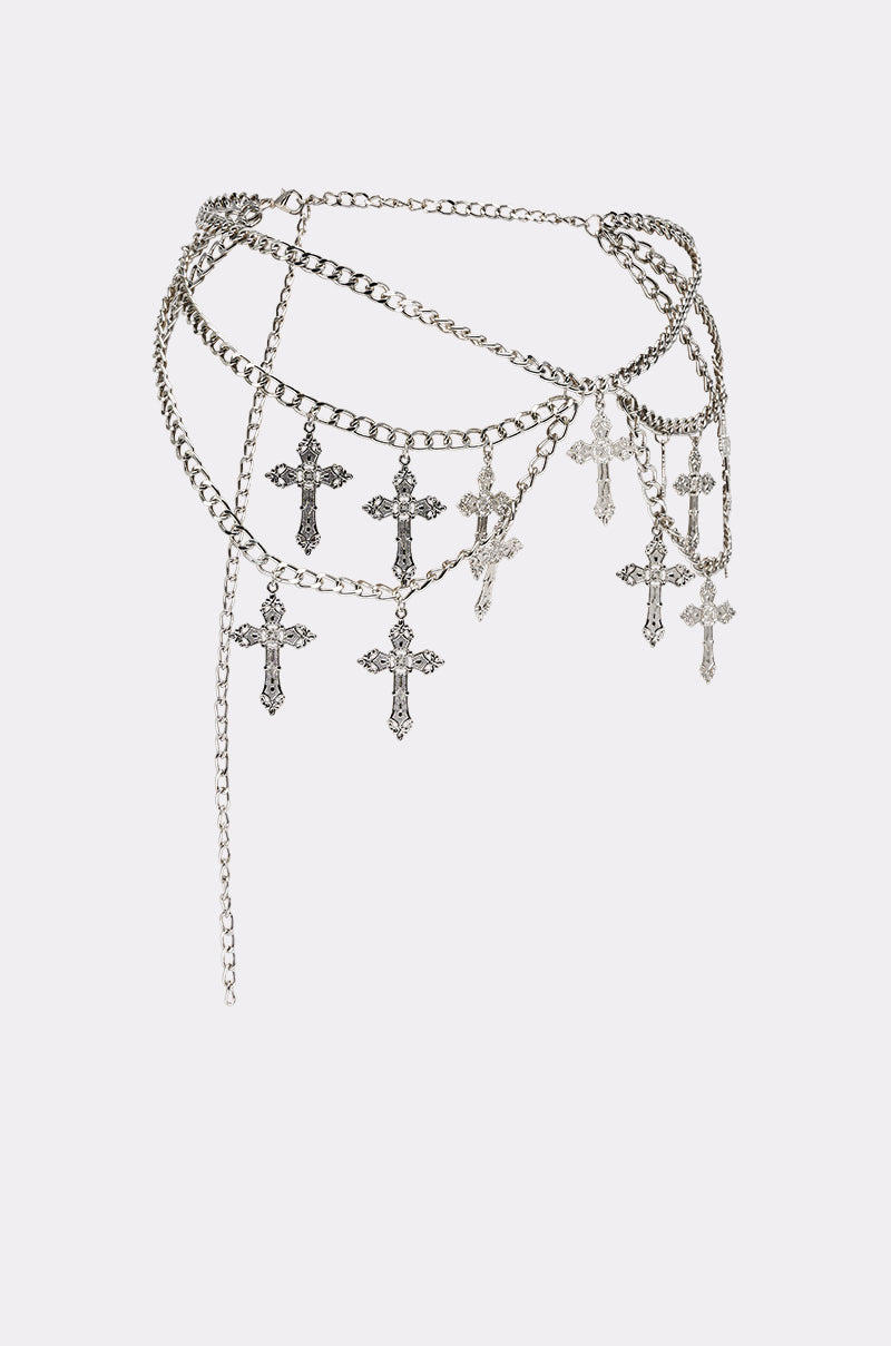 The CROSS MY HEART CHAIN BELT features layered chains with multiple hanging cross charms, showcased on a plain white background. 2