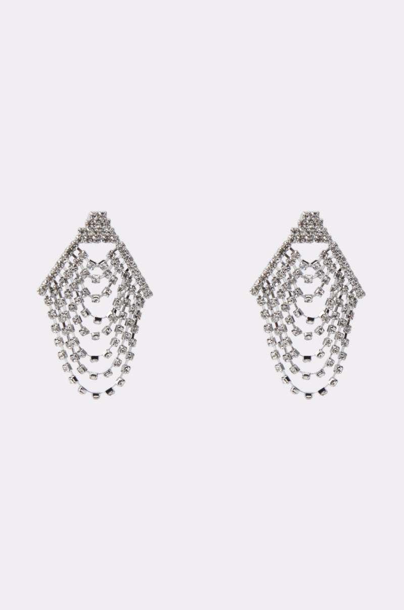 The TO THE GALA EARRING IN SILVER features a chandelier design with multiple rows of sparkling rhinestones in a fan pattern, shown against a plain white background.