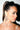 A woman with sleek, dark hair in a high ponytail wears dramatic makeup and the TO THE GALA EARRING IN SILVER from AKIRA Label, along with a rhinestone choker, looking to the side against a white background.