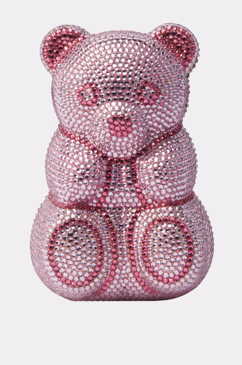 The YUMMY GUMMY BLING BAG is a teddy bear-shaped purse adorned with sparkling pink and silver rhinestones, shown against a plain light background.