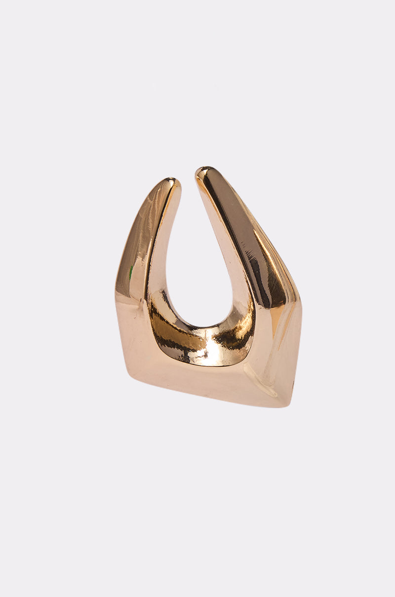 The ORIGINAL EARRING from AKIRA Label is a shiny gold geometric piece with an open, angular design, two upward curved ends, and a flat base, shown against a plain white background. 3