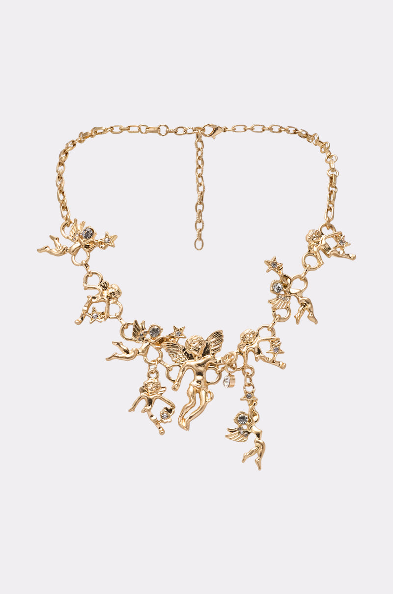 The ANGELIC NECKLACE features detailed gold cherubs and star charms with gemstone accents on an adjustable chain. This vintage-inspired piece is perfect for anyone who loves ornate jewelry styles. 0