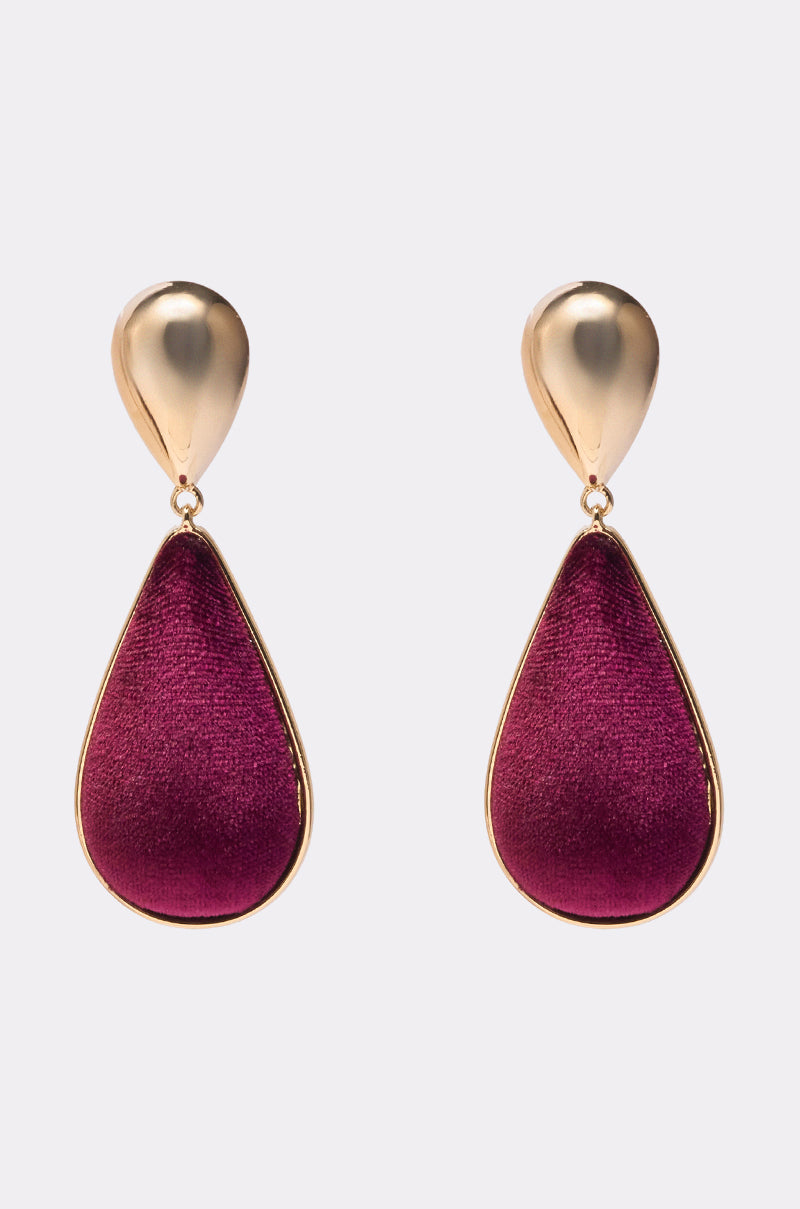 The THAT GURL EARRING features gold-tone teardrop studs with larger deep purple velvet teardrop pendants outlined in gold, adding elegance and sophistication to any outfit.