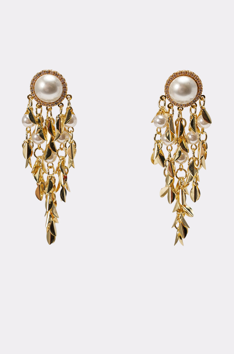 PARADISE EARRING features gold leaf designs with round pearl studs, layered white beads, and small gold charms for a cascading statement look against a plain background. 1
