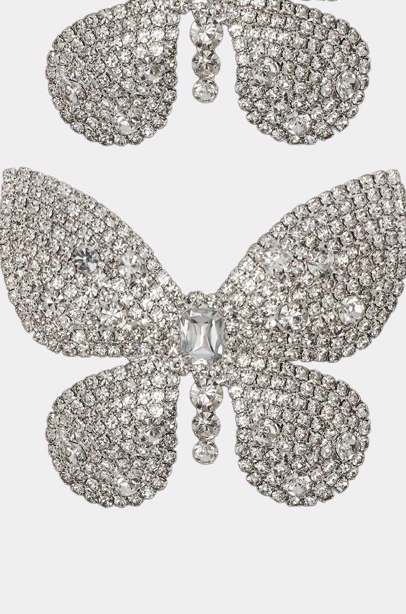 A close-up of the FLY AWAY HAIR CLIP SET, featuring ornate crystal butterfly clips encrusted with sparkling clear rhinestones against a plain light background. 5