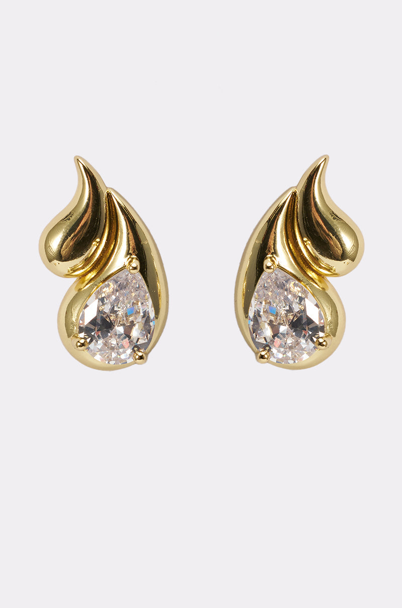 The OLD MONEY EARRING is a pair of gold teardrop earrings with clear gemstones at the base and a smooth, curved gold wrap—perfect as wedding earrings or elegant crystal studs for any special occasion. 1