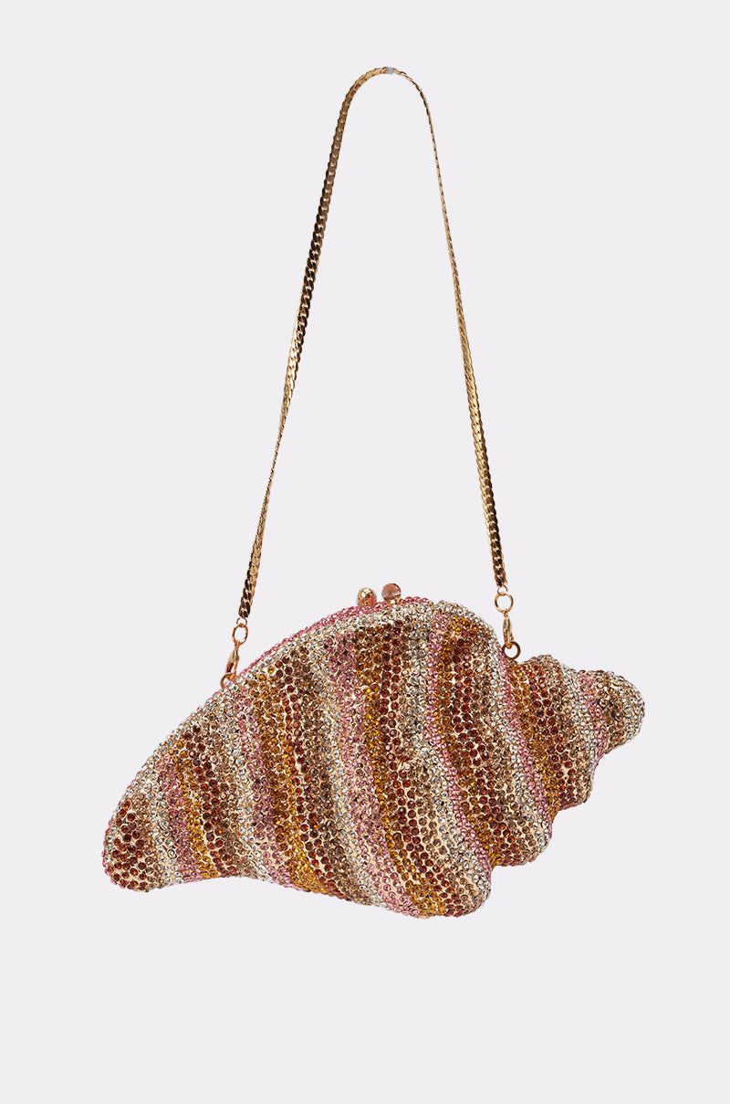 The THIS IS MY SHELL BLING CLUTCH features a shell shape adorned with sparkling gold, pink, and silver rhinestones and a long gold chain strap—ideal as a vacation handbag or rhinestone evening bag, shown on a plain white background. 4