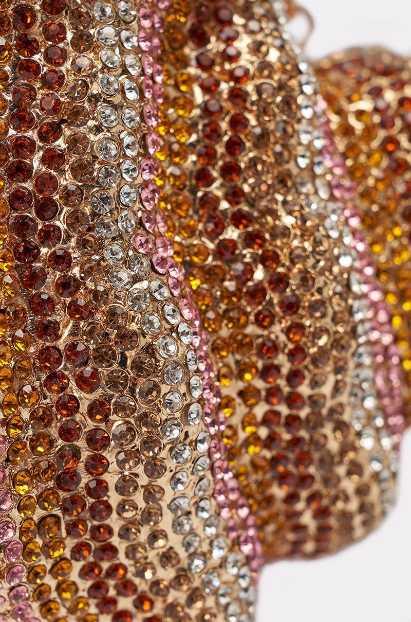 The THIS IS MY SHELL BLING CLUTCH features a shell shape covered in sparkling gold, brown, pink, and silver rhinestones for a shimmering, textured look—an ideal chic accessory for your next beach vacation. 7