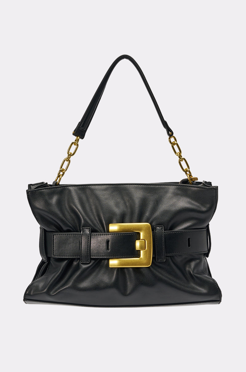 The OVERSEAS BUCKLE CLUTCH is a black faux leather handbag with a soft ruched texture, a large gold buckle front detail, short handle, and gold chain accents—ideal as your next statement piece. 1