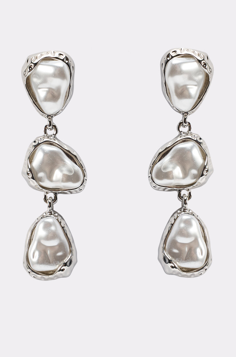 The SUE EARRING features three baroque-style faux pearls in textured silver-tone frames, linked vertically—elegant evening accessories displayed on a plain white background. 2