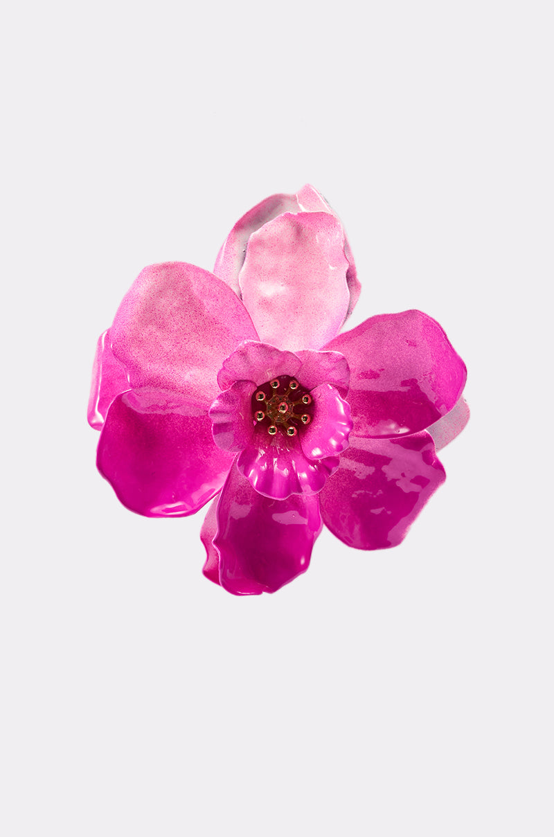 A close-up of the DONT TALK TO ME EARRING, featuring a single pink flower with five glossy, translucent petals and a yellow center, evokes vacation-ready charm against a plain white background. 6
