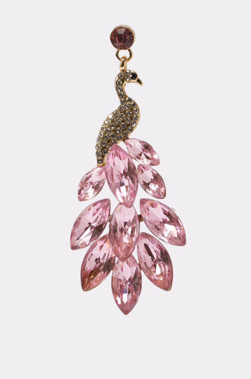The IN MIAMI EARRING features a gold-toned peacock design adorned with sparkling stones and an elaborate tail of large, pink marquise gemstones—perfect for making a striking statement. 3